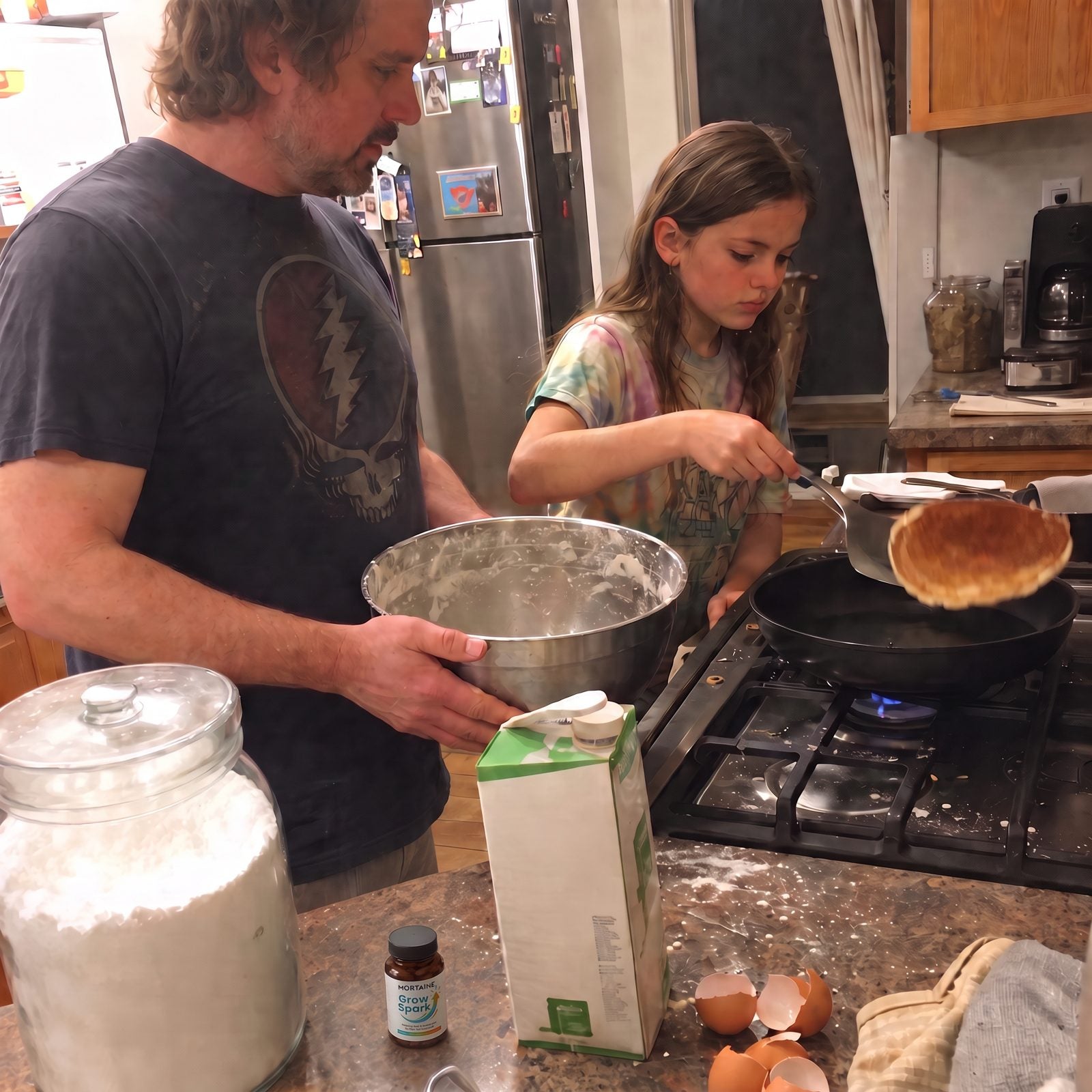 A dad and his daughter with Grow Spark in the kitchen
