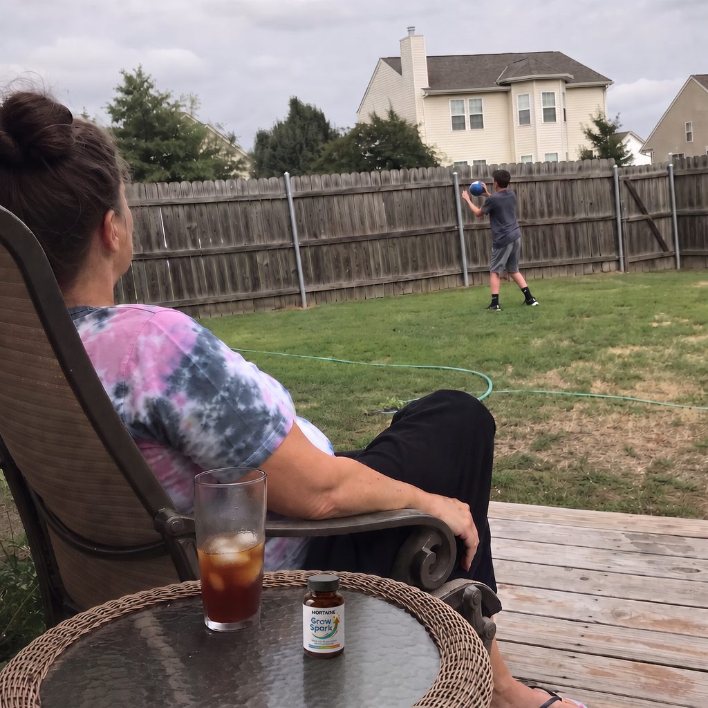 A mom and her son with Grow Spark in the backyard